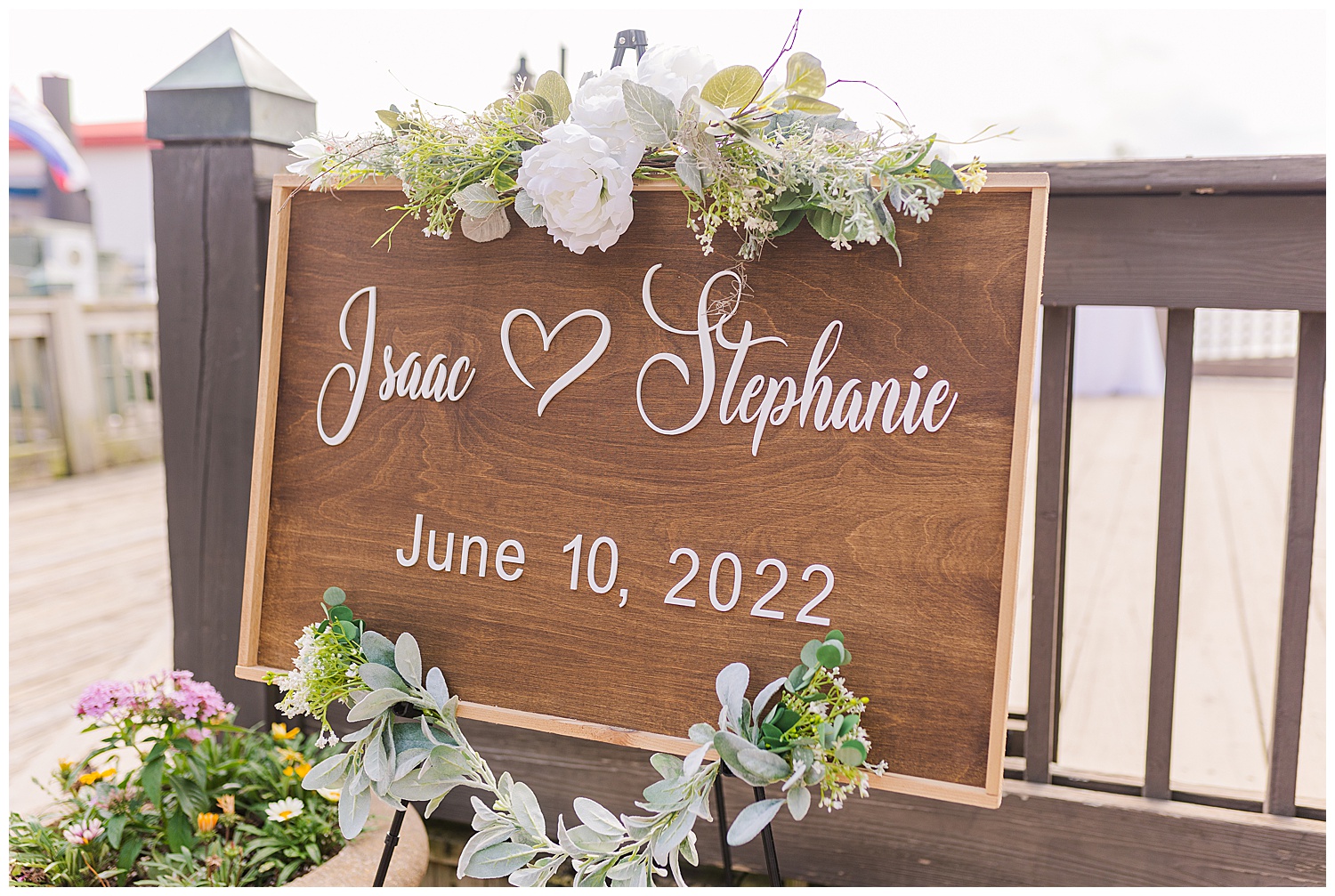 wood wedding sign at outdoor summer ceremony in Wilmington