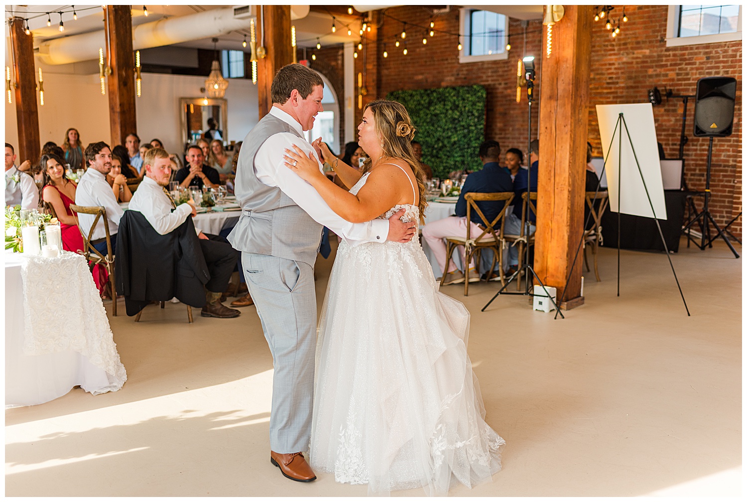 bride and groom first dance at The River Room wedding venue