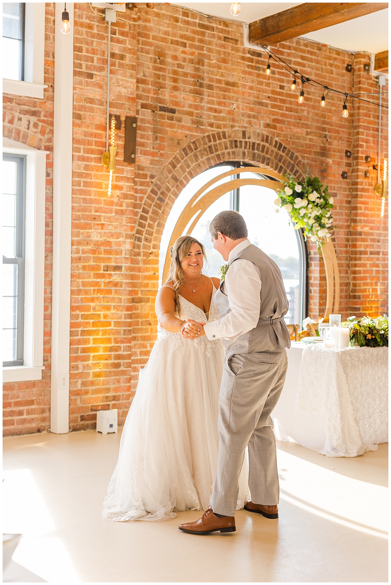 bride and groom first dance at The River Room wedding venue