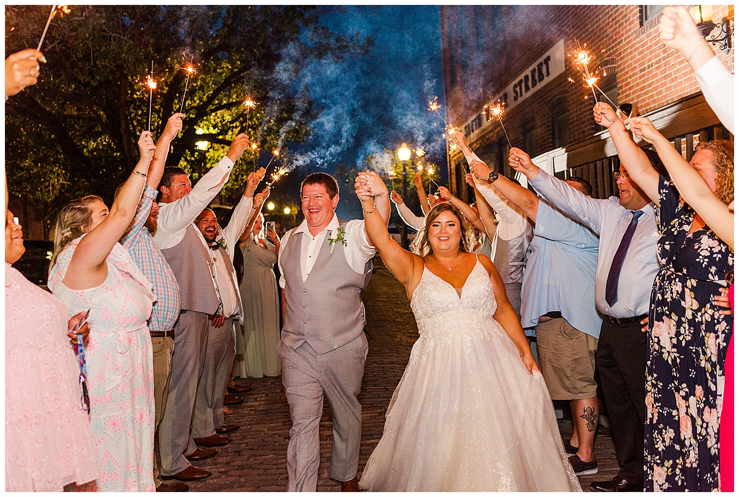 bride and groom sparkler exit at The River Room