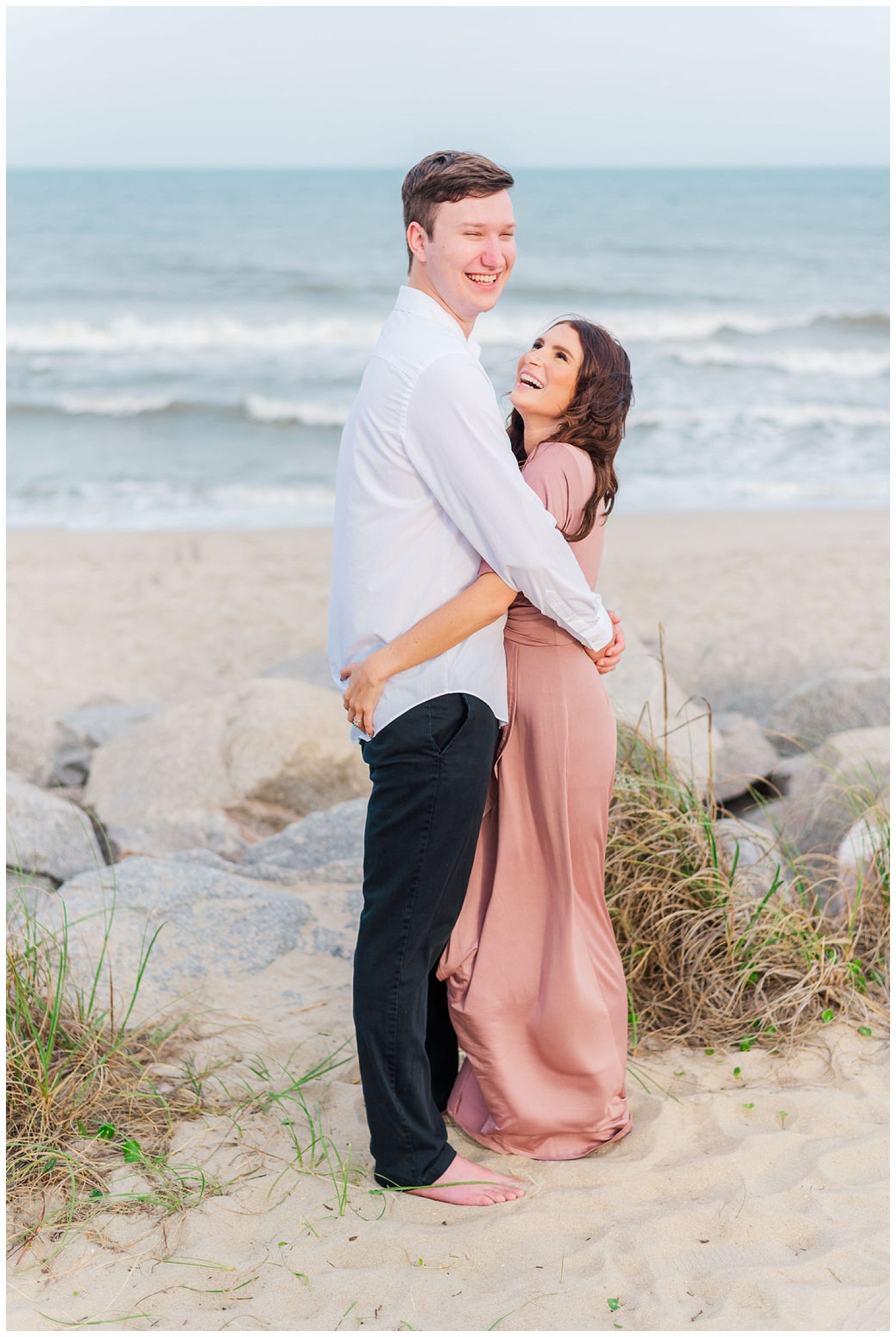 couple hugging on Kure Beach during North Carolina engagement session