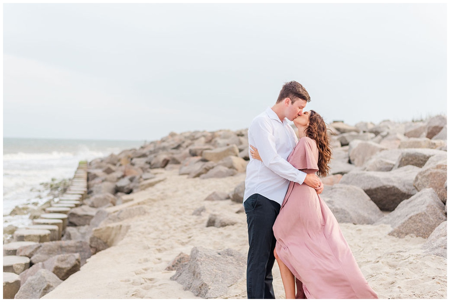 couple kissing during Kure Beach engagement session