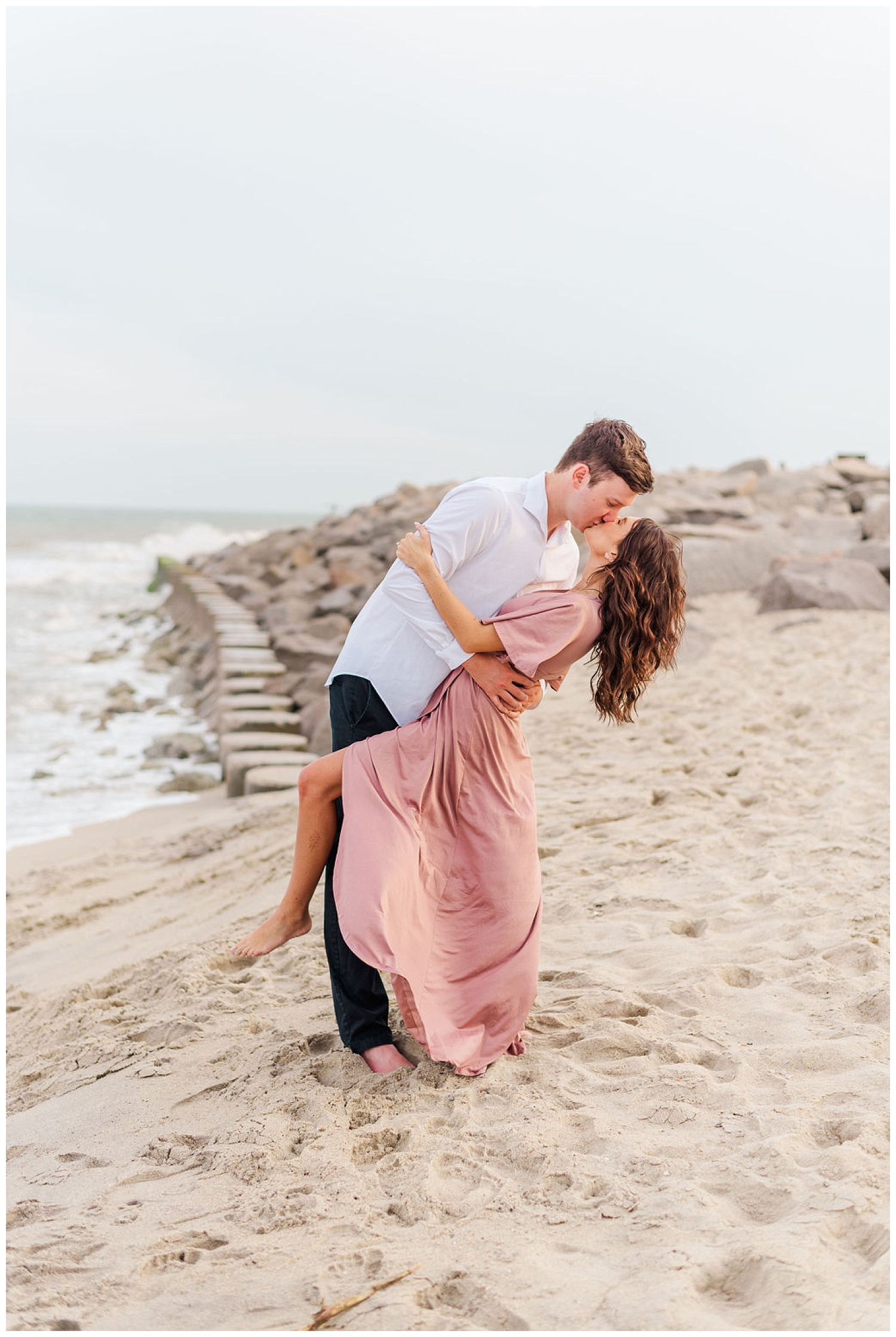 couple kissing during Kure Beach engagement session