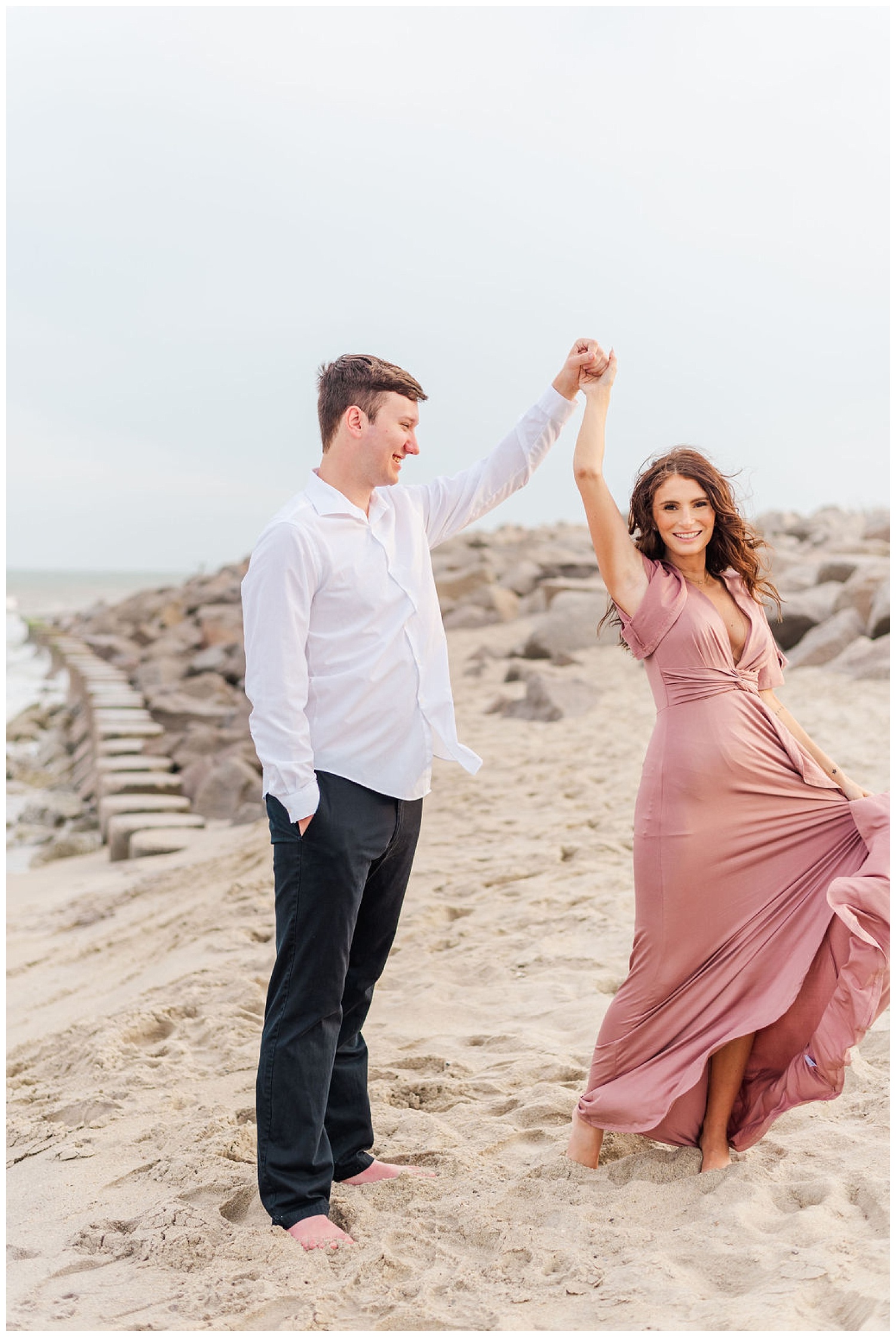 couple dancing on the beach at Kure Beach engagement session
