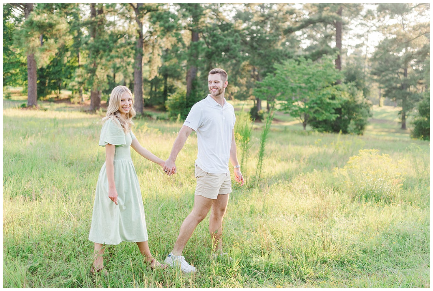 couple holding hands during engagement photos in North Carolina