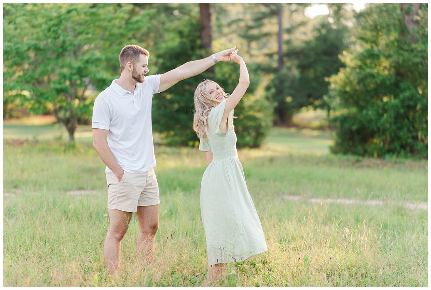 couple dancing during engagement photos in North Carolina
