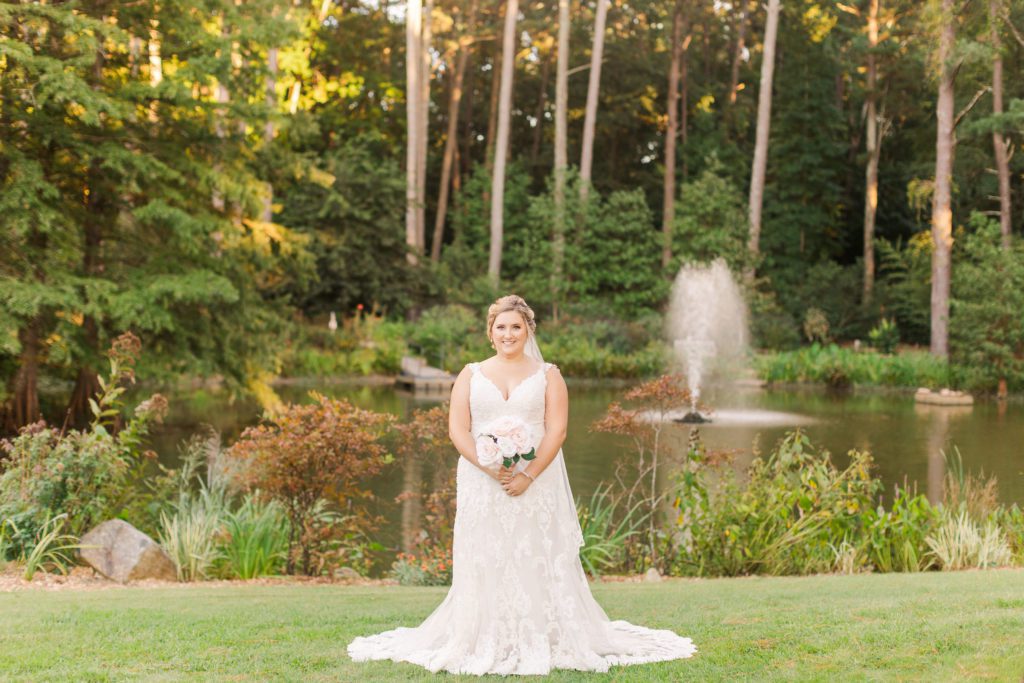 bride holding her bouquet at Cape Fear Botanical Gardens in North Carolina