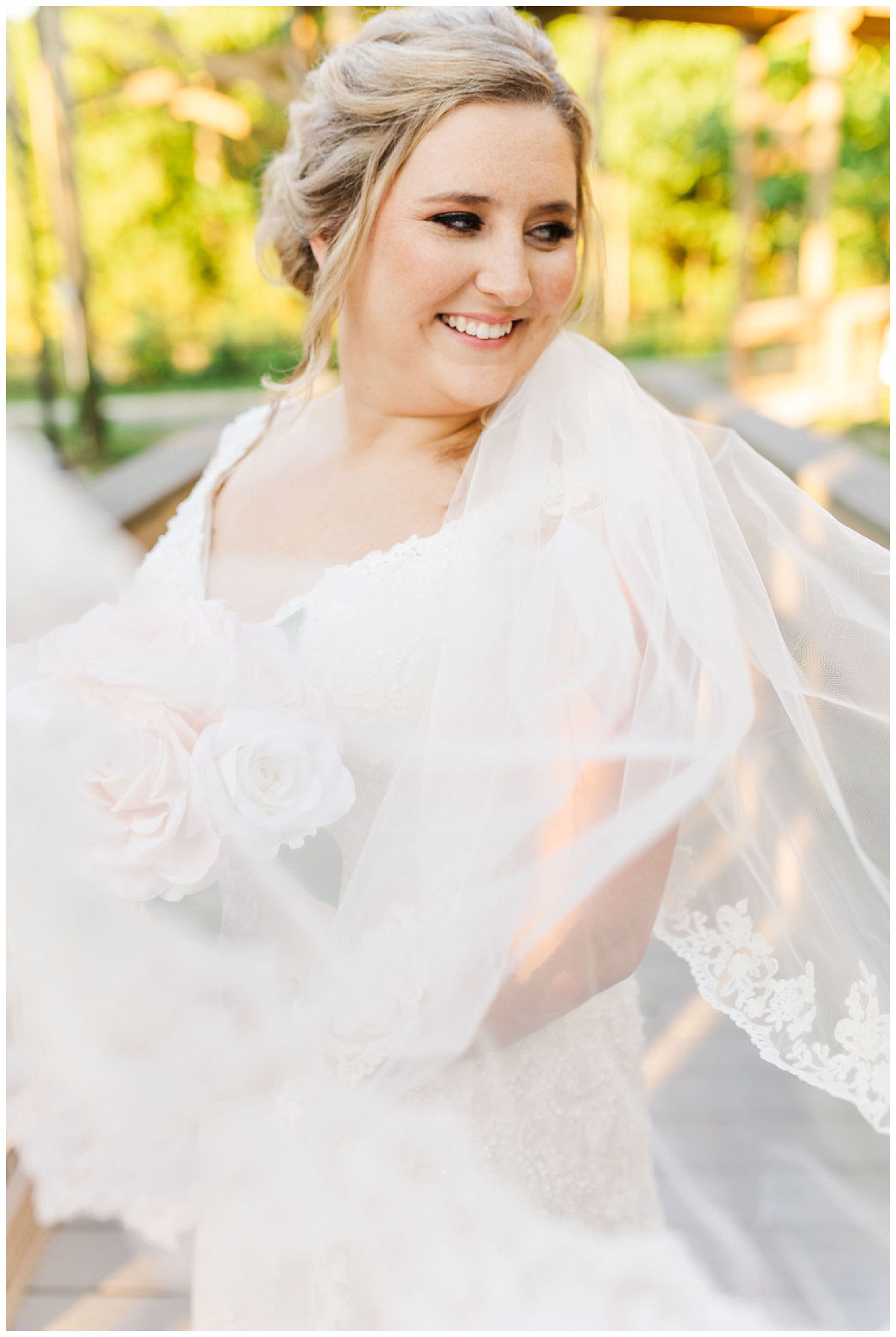 veil wrapped around the bride at the Cape Fear Botanical Gardens