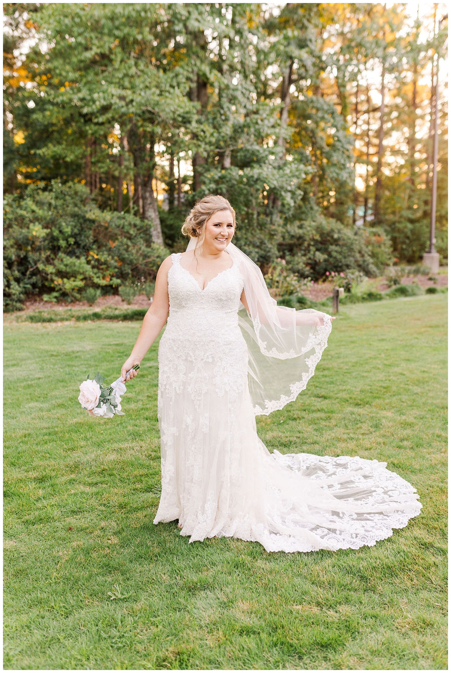 bride holding veil and bouquet at North Carolina bridal session