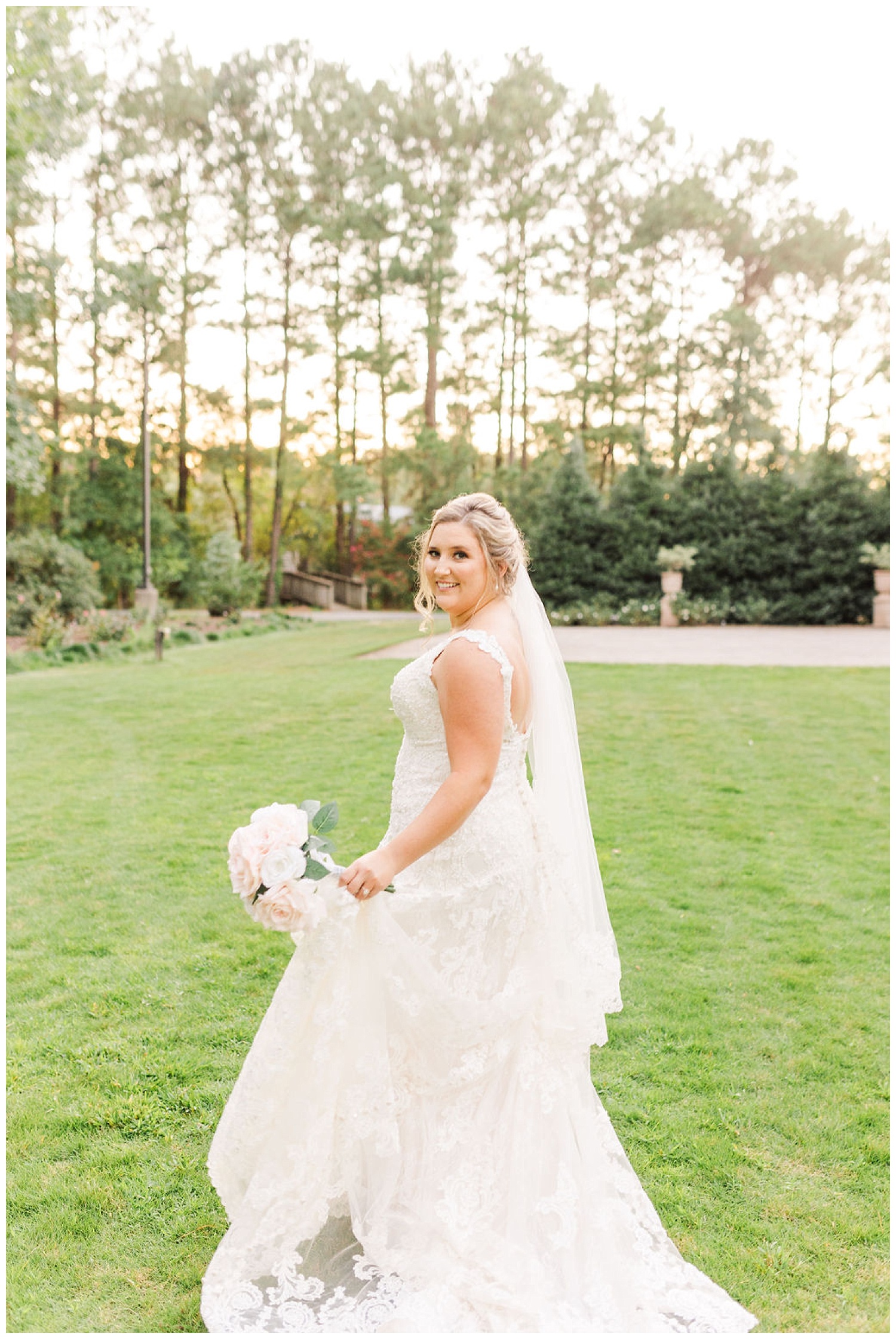 bride holding dress and bouquet at bridal session