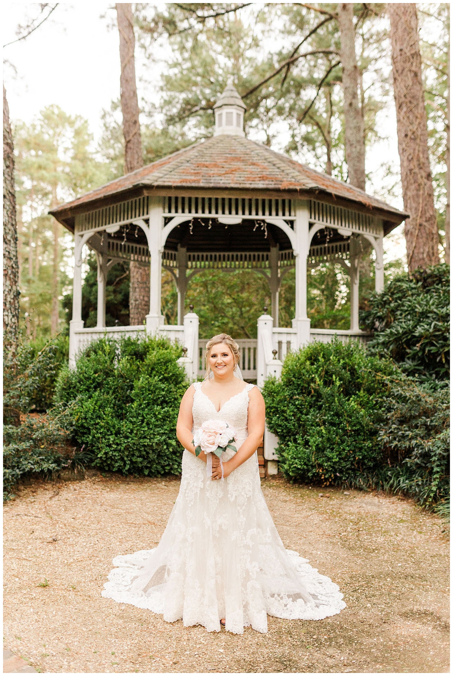 bride standing in front of a white gazebo at North Carolina bridal session