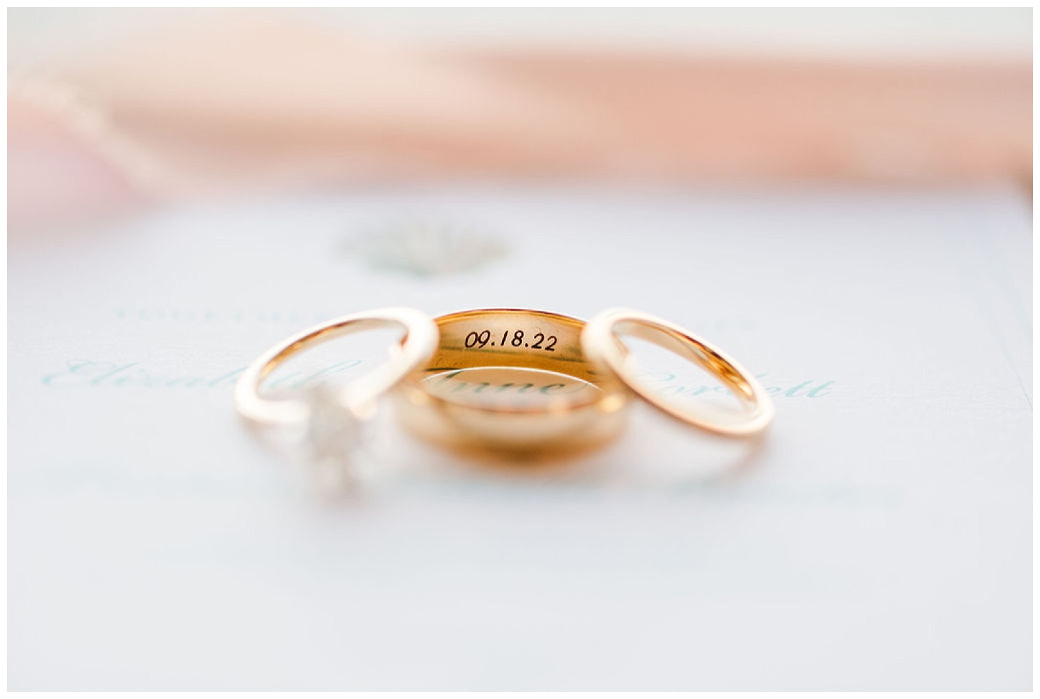 all three wedding rings with the date shown on the inside of the ring