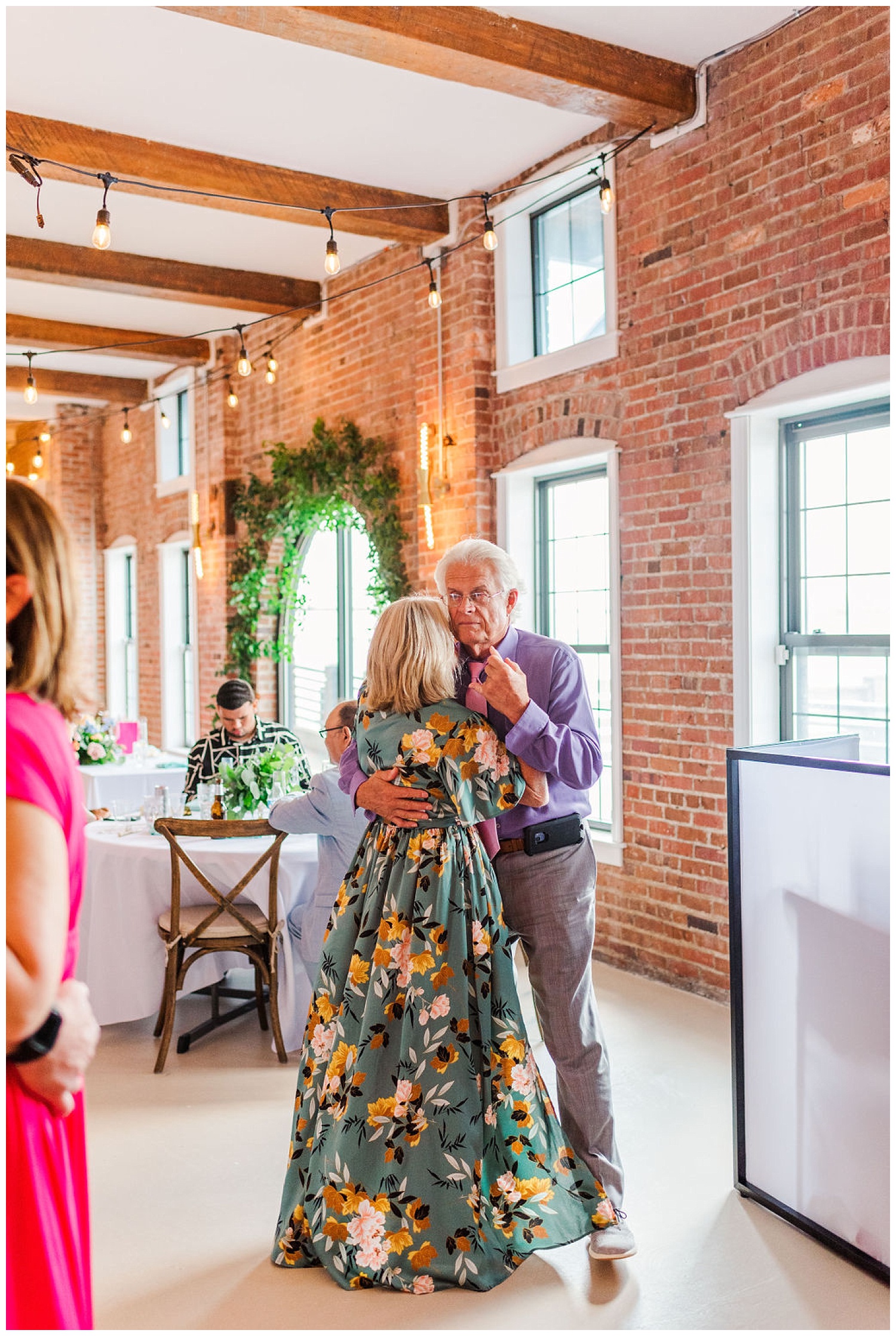 wedding guests dancing at a reception at the River Room