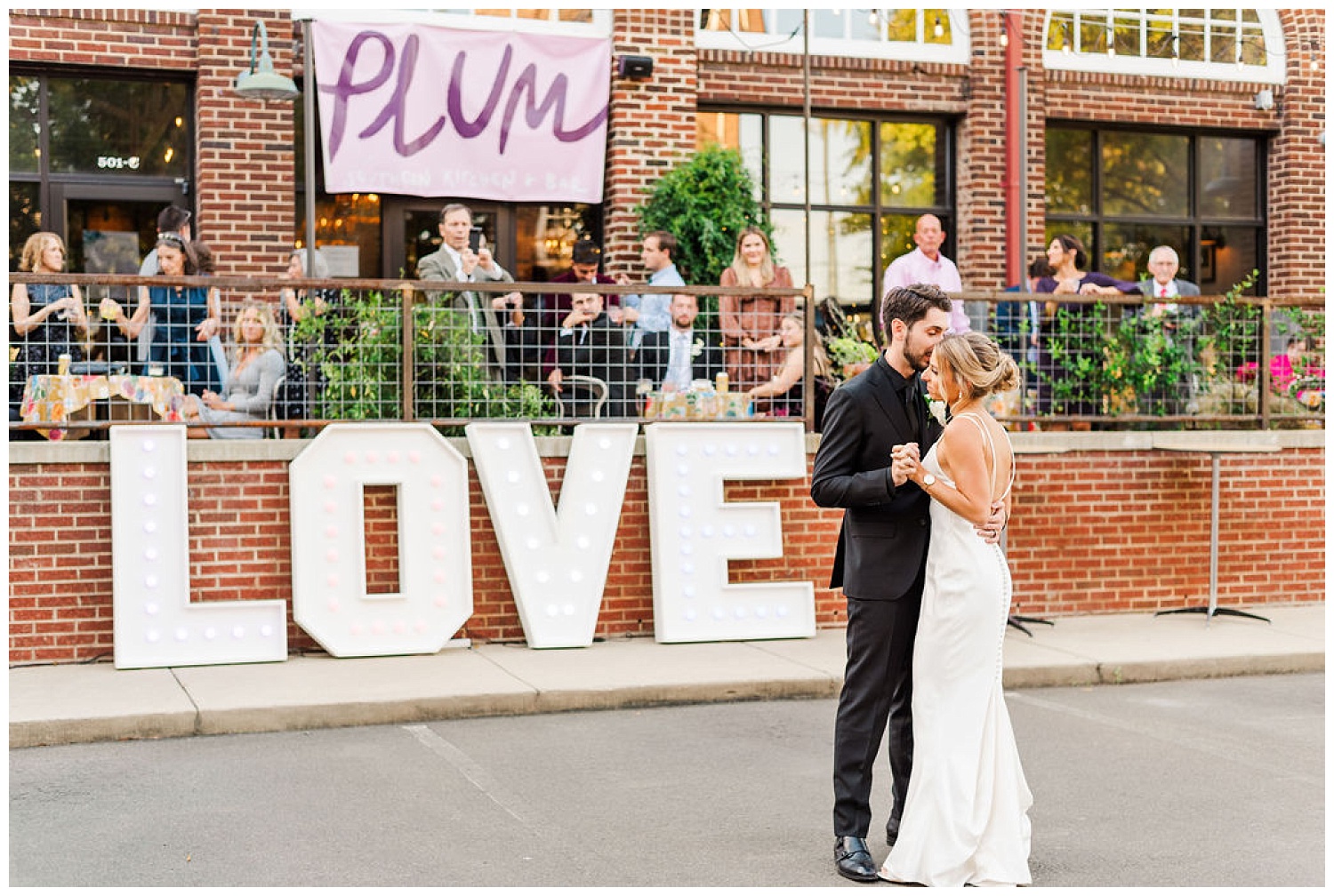 wedding couple dancing outside the Plum Kitchen in Durham