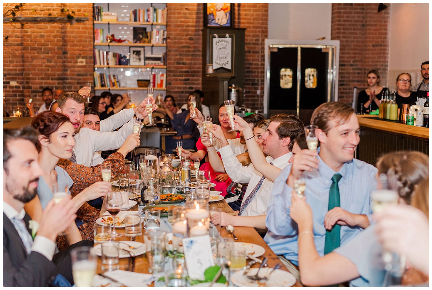 wedding reception toasts at the Plum Kitchen in Durham