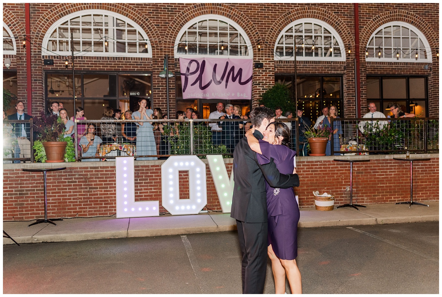 groom dancing with his mom at the Plum Kitchen in Durham