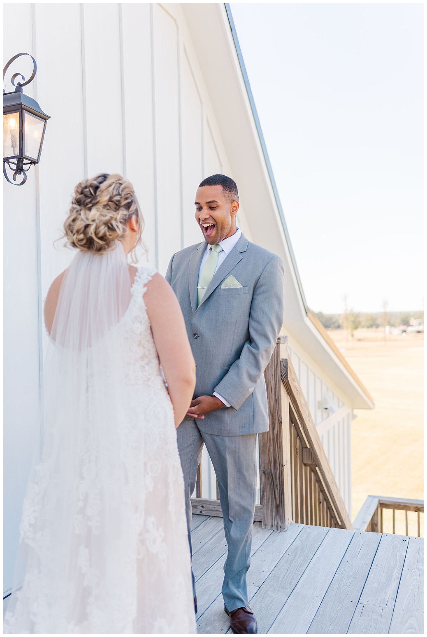 first look with bride and groom at wedding at The Carolina Barn