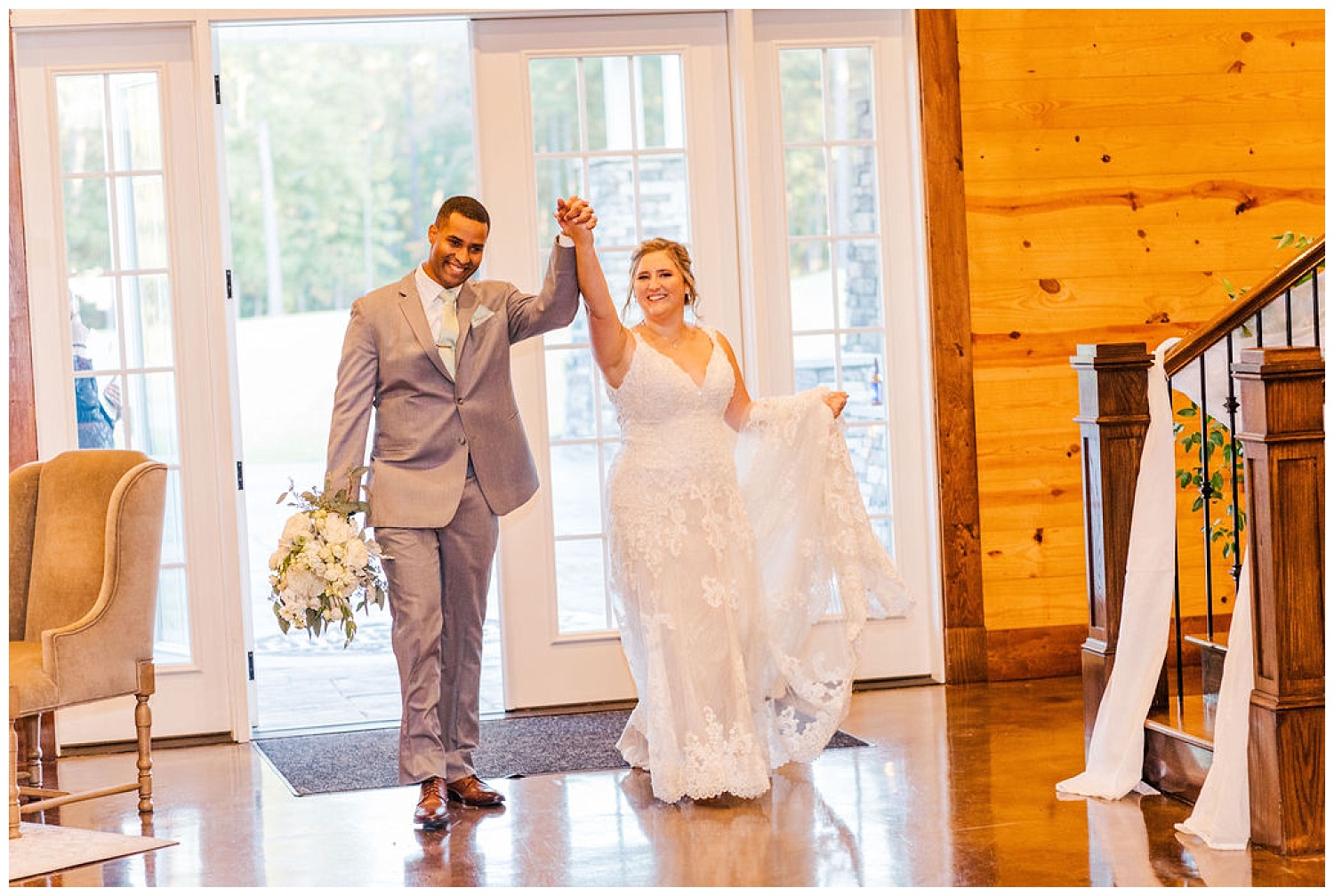 bride and groom walking into reception at The Carolina Barn