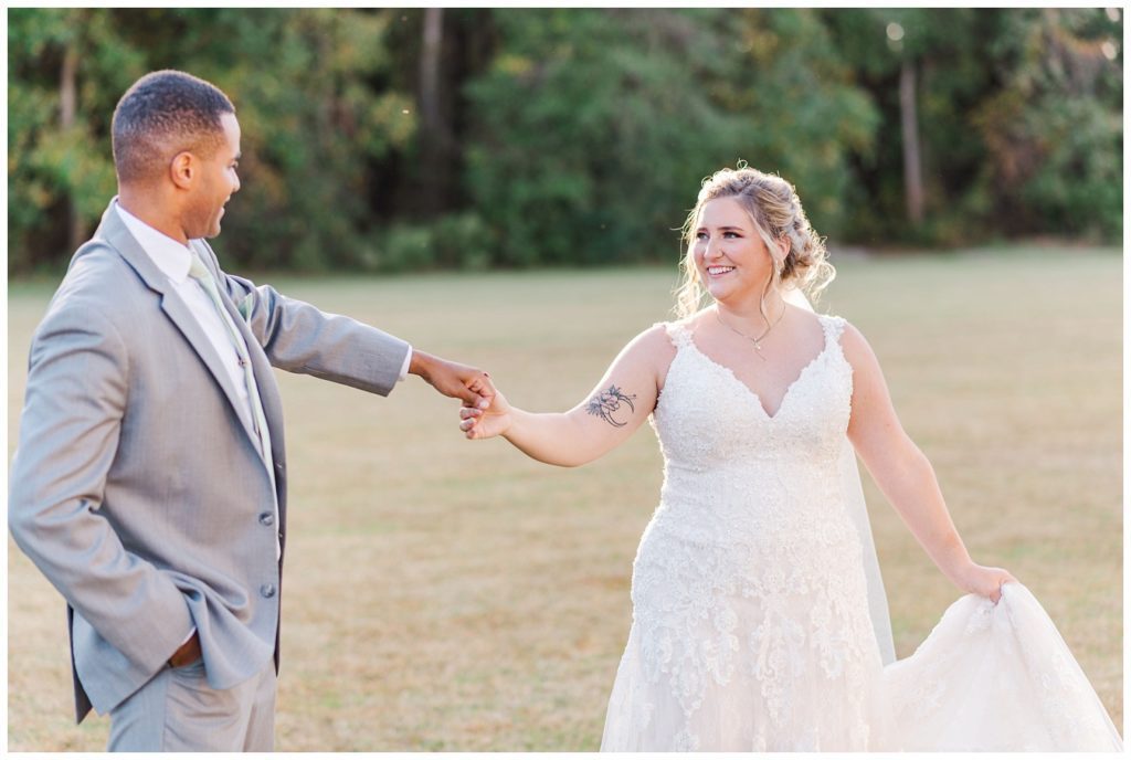 bride and groom portraits at golden hour at The Carolina Barn