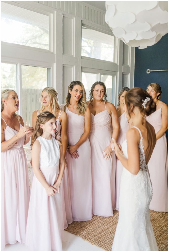 first look with bride and bridesmaids at Wilmington wedding
