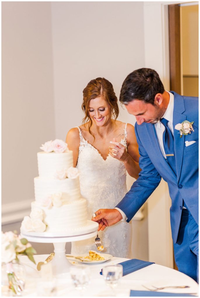 bride and groom cutting their cake at Pine Valley Country Club