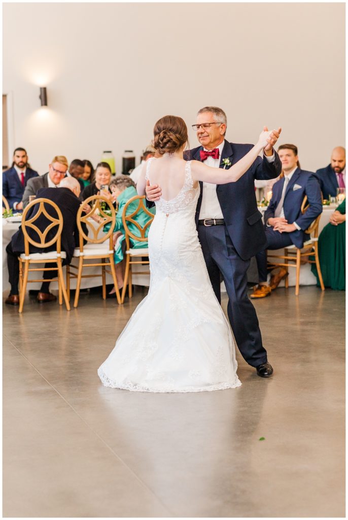bride dancing with dad at fall wedding in Raleigh