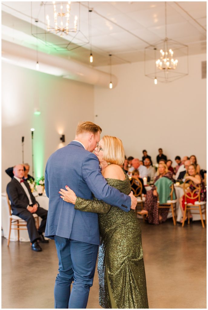 groom and his mom having dance at Raleigh fall wedding