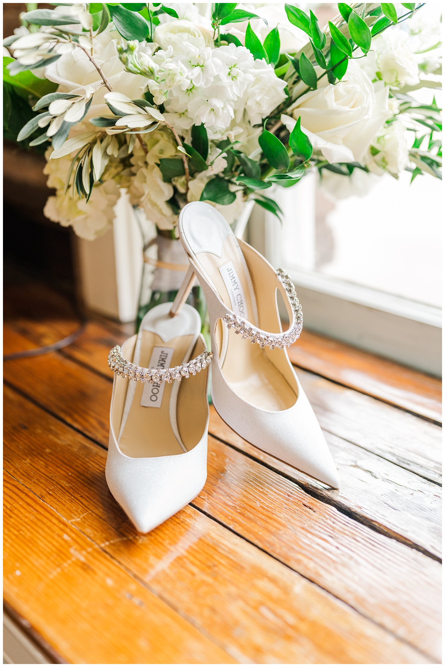bridal bouquet sitting in a window with white shoes in Wilmington