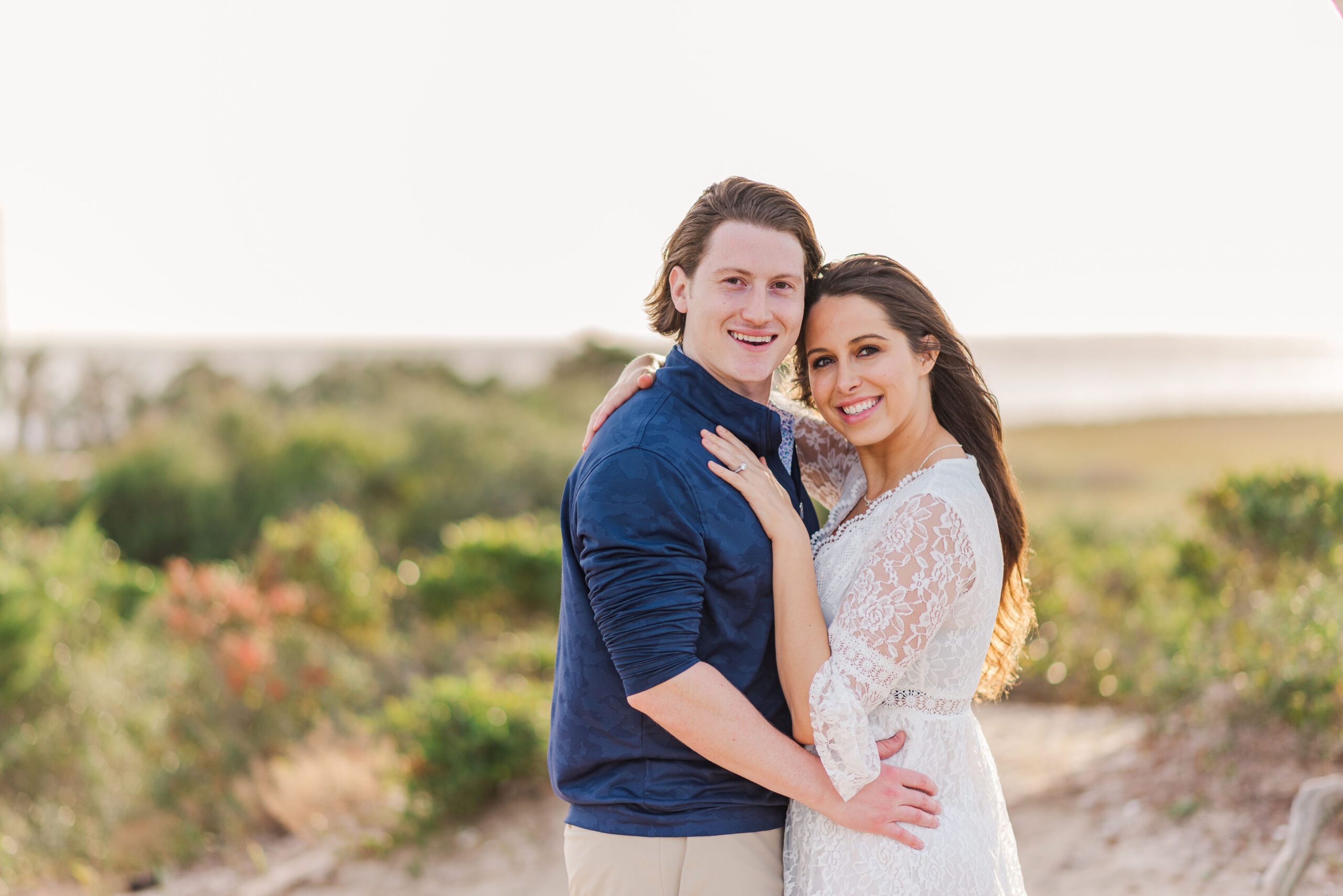 couple hugging at Fort Fisher engagement session