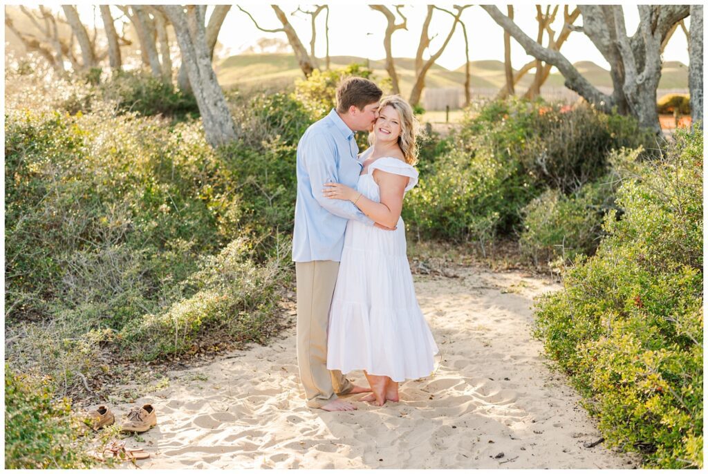 couple posing for Fort Fisher engagement session