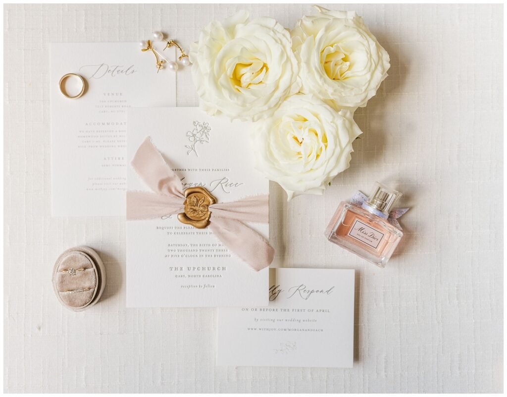 wedding details with white flowers by North Carolina photographer