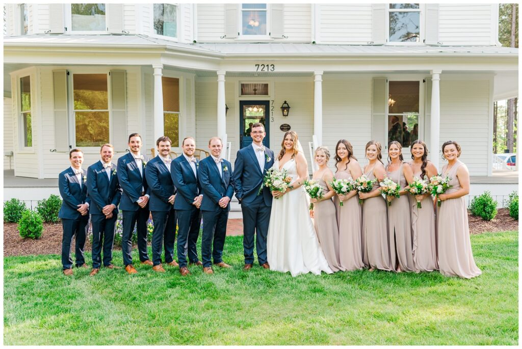 full bridal party in front of the Upchurch venue