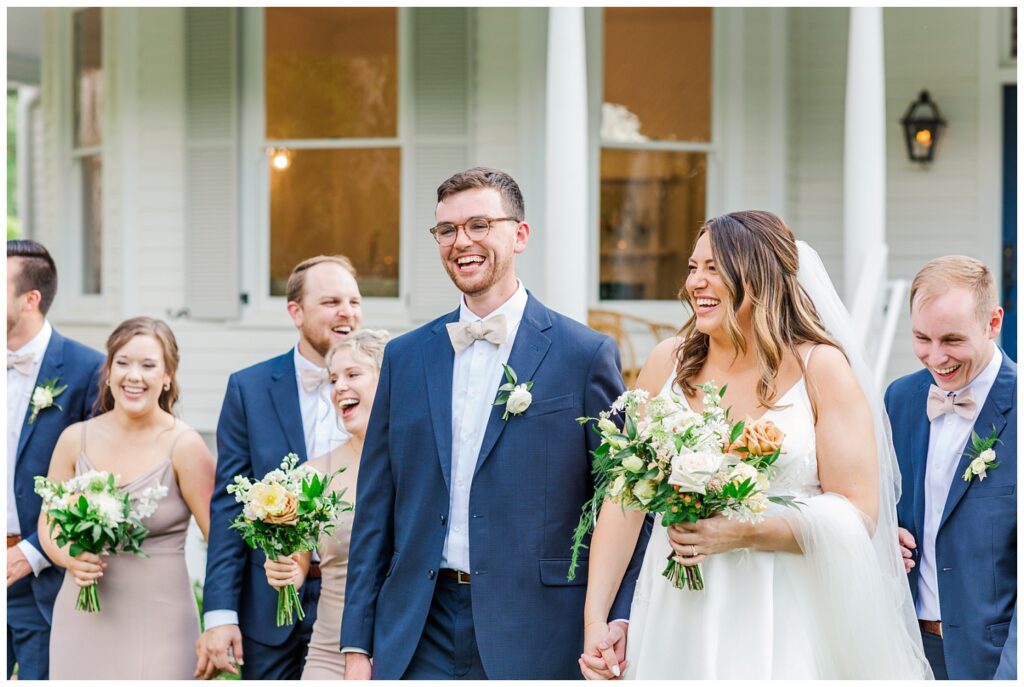 wedding couple walking with bridal party in North Carolina
