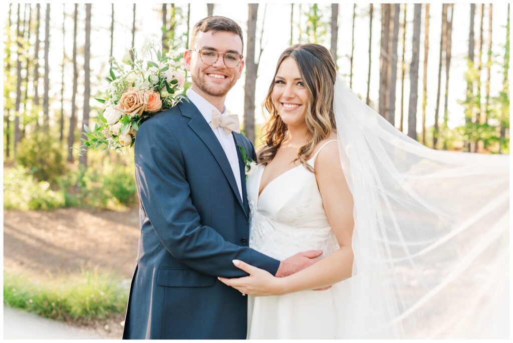 bride and groom smiling at wedding in North Carolina 