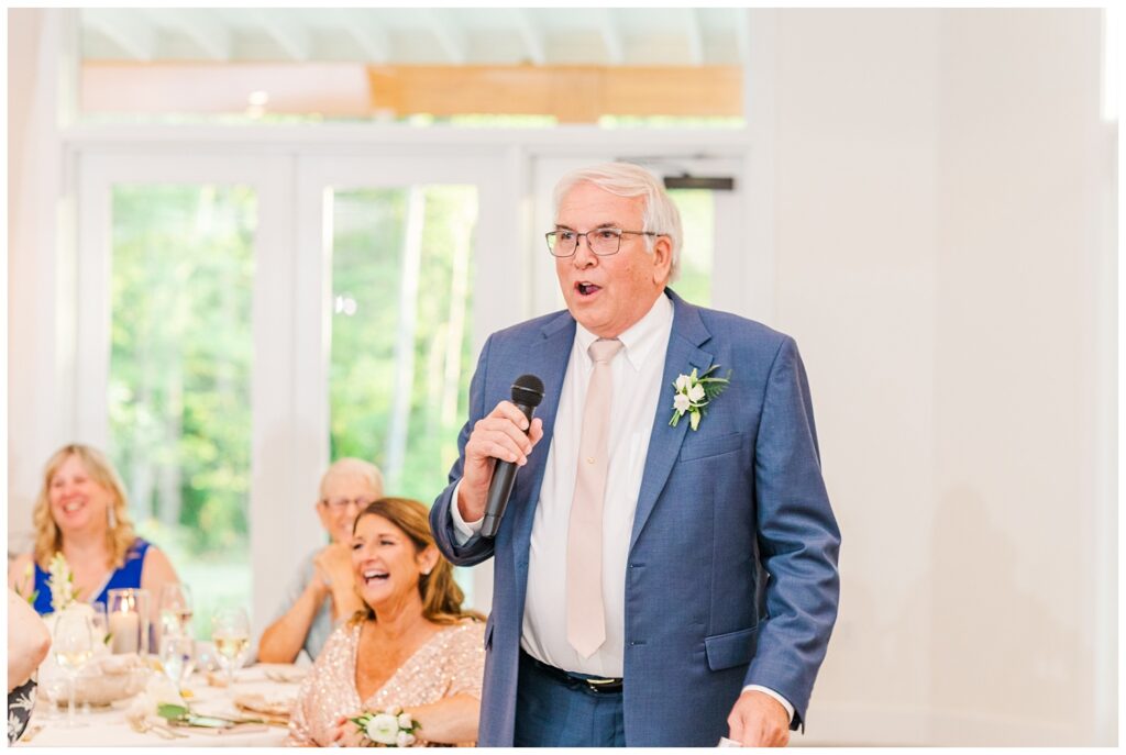 bride's dad giving a toast at wedding reception 