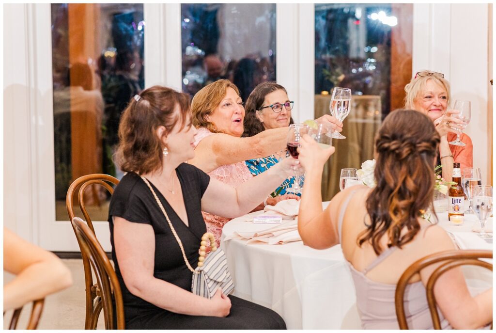 guests toasting at the Upchurch venue wedding reception