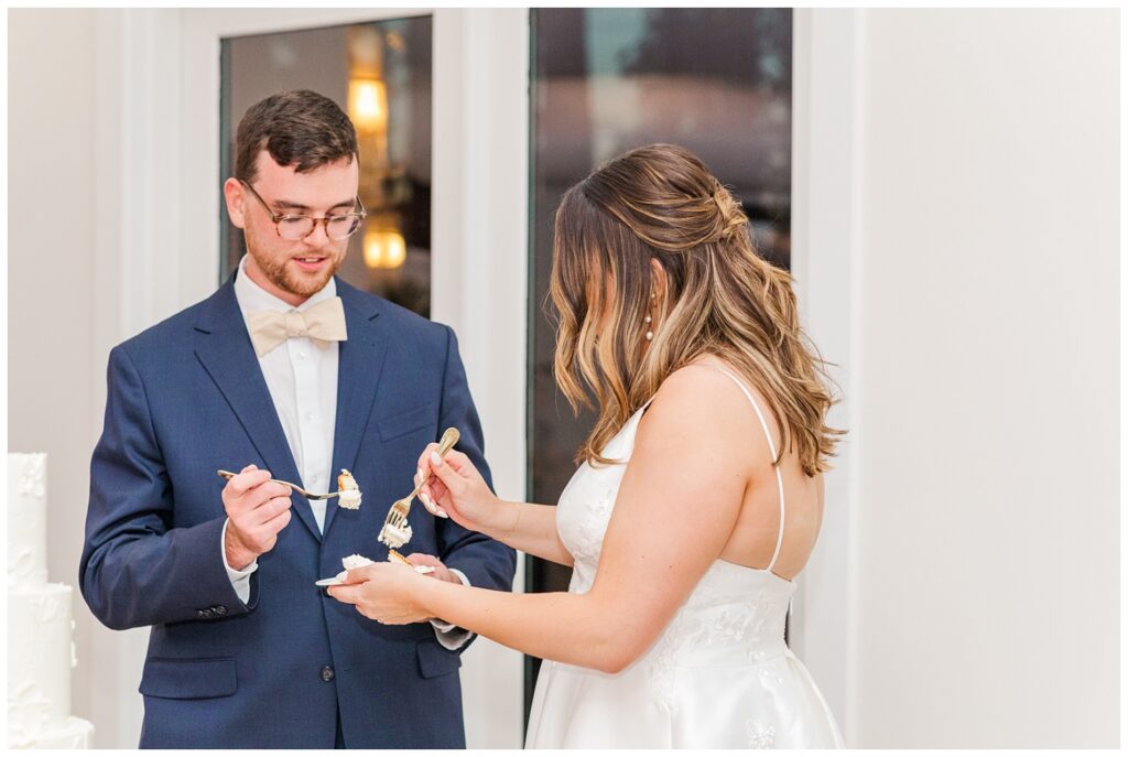 bride and groom cutting their cake at North Carolina reception