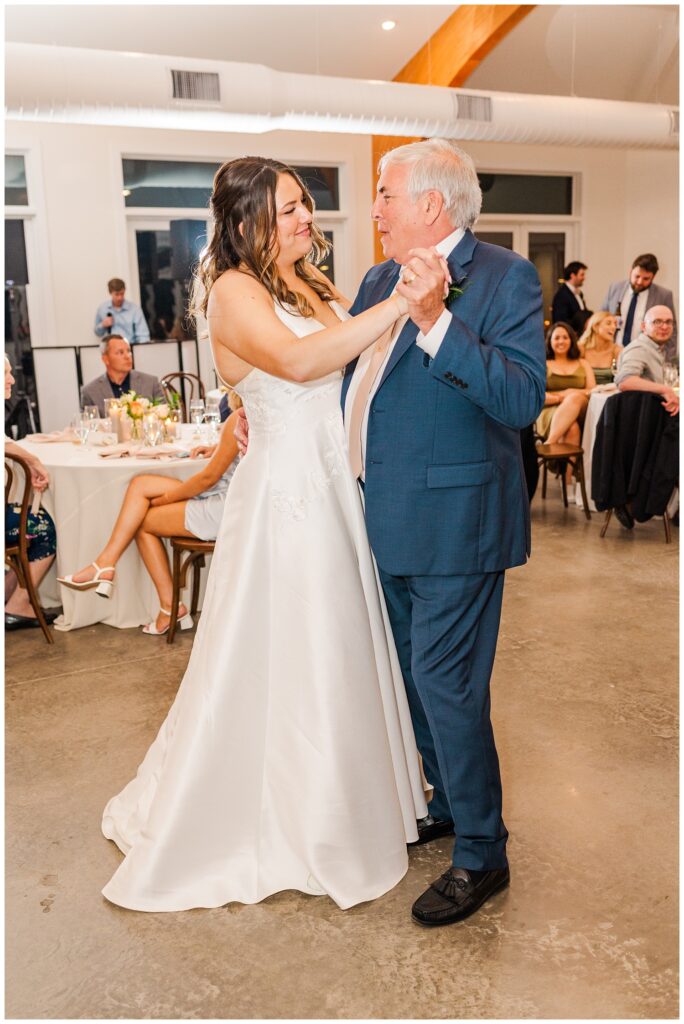 bride and dad having first dance at wedding reception in North Carolina