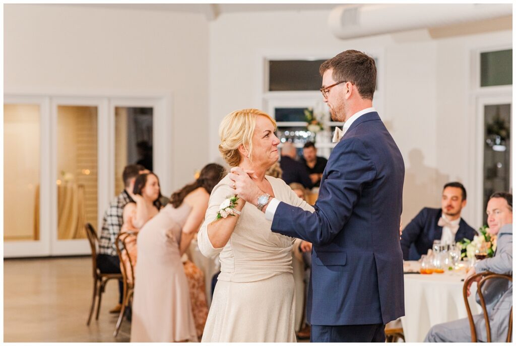 groom and mom having first dance at wedding reception in North Carolina
