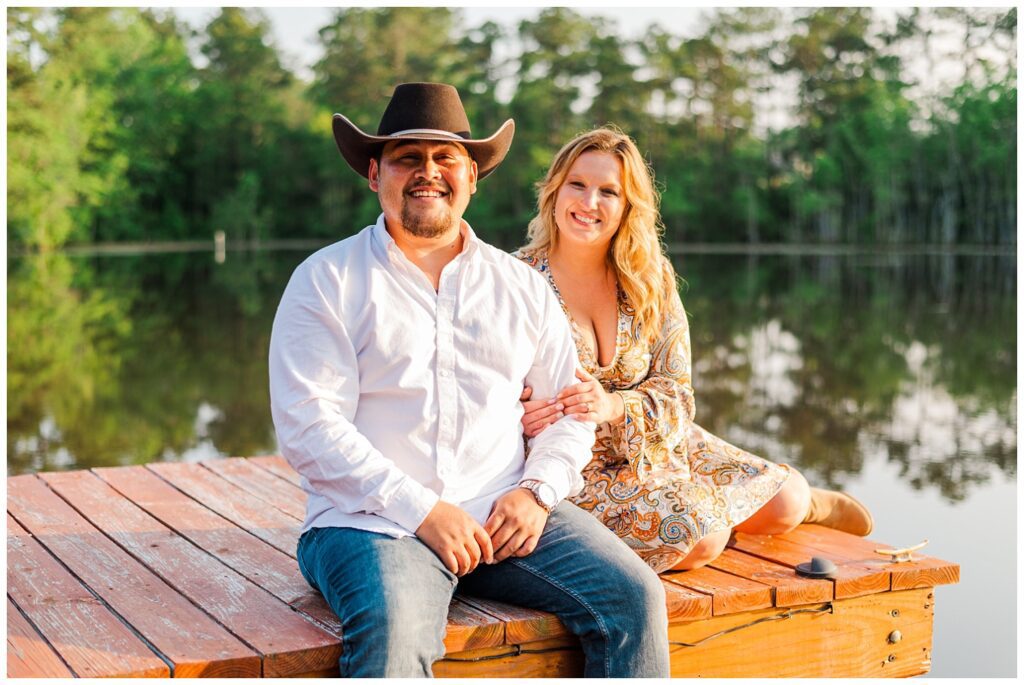farm engagement session on a dock in Fayetteville