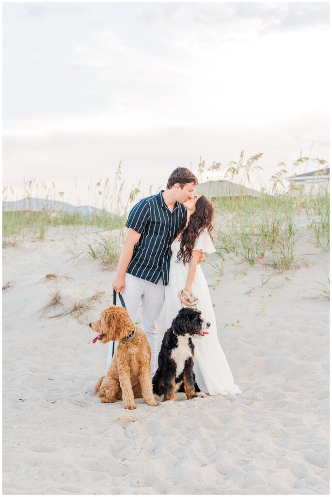 summer engagement session on the beach with dogs 