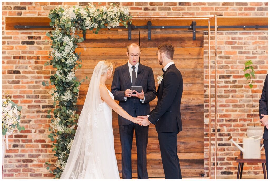 fall wedding ceremony at the Meadows Raleigh venue