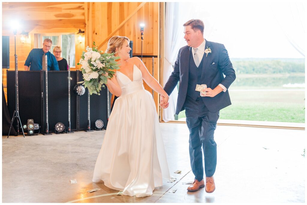 bride and groom make entrance into wedding reception in Richmond VA