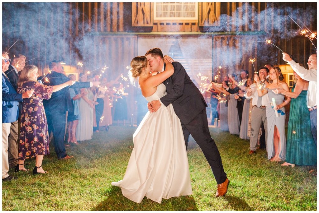 sparkler exit with bride and groom kissing at the end at Richmond VA wedding venue