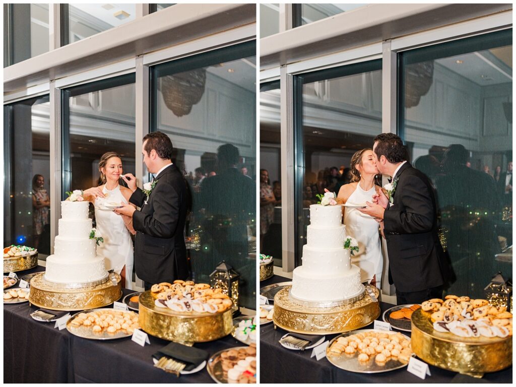 wedding couple cutting their four tiered white cake at City Club Raleigh