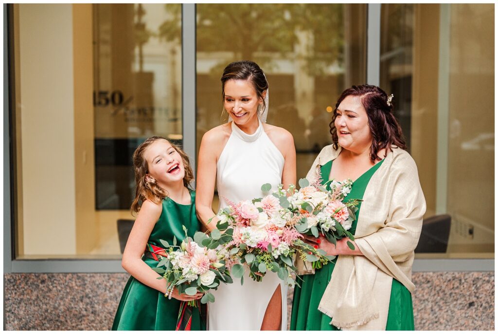 bride posing with her niece and sister at Raleigh NC wedding