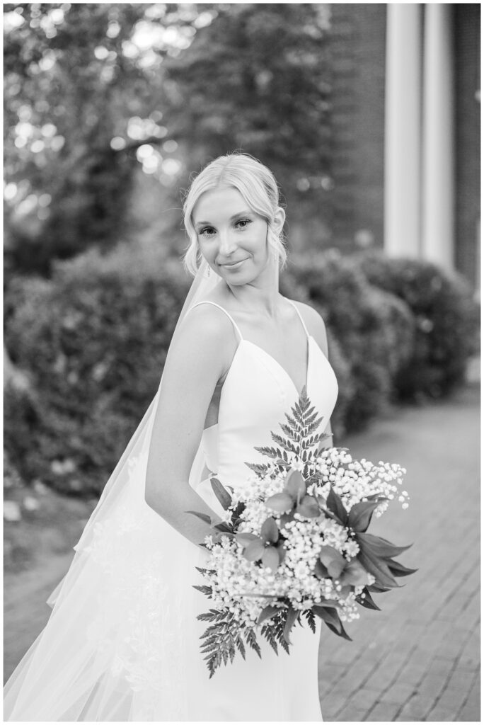 bride smiling at bridal portrait session at Meredith College 