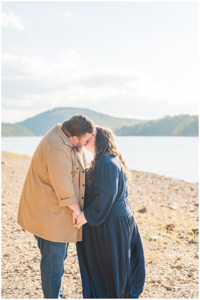 couple kissing at Carvins Cove lake in Virginia 