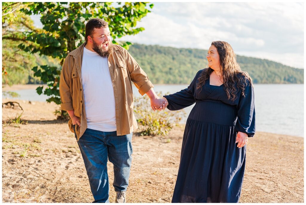 couple laughing together at Carvins Cove engagement session