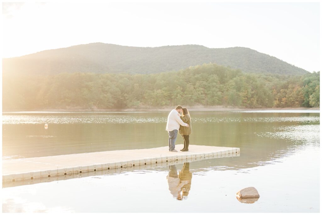 couple standing on the dock during golden hour in Roanoke, VA